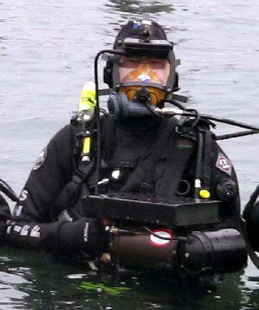 Member of Pierce County Sheriff Dive Team, WA holds a diver-held DIDSON